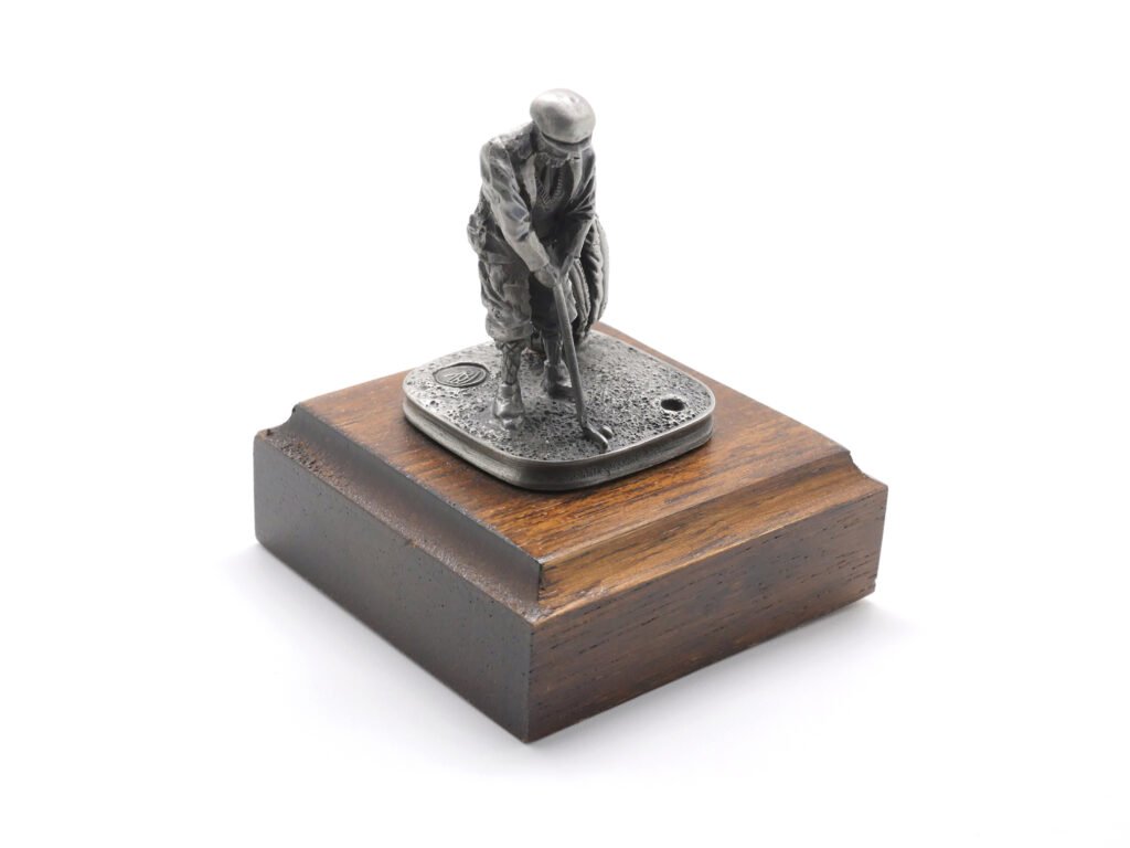 Pewter Golfer Putting on Dark Wood Base